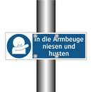 In die Armbeuge niesen und husten