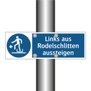 Links aus Rodelschlitten aussteigen