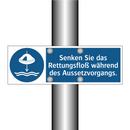 Senken Sie das Rettungsfloß während des Aussetzvorgangs.