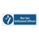 Nur bei Stillstand öffnen