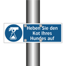 Heben Sie den Kot Ihres Hundes auf