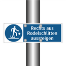 Rechts aus Rodelschlitten aussteigen