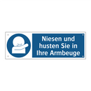 Niesen und husten Sie in Ihre Armbeuge
