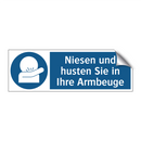 Niesen und husten Sie in Ihre Armbeuge