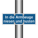 In die Armbeuge niesen und husten