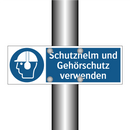 Schutzhelm und Gehörschutz verwenden