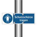 Schutzschürze tragen