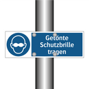 Getönte Schutzbrille tragen