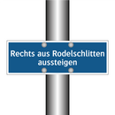 Rechts aus Rodelschlitten aussteigen