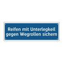 Reifen mit Unterlegkeil gegen Wegrollen sichern