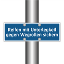 Reifen mit Unterlegkeil gegen Wegrollen sichern