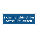 Sicherheitsbügel des Sessellifts öffnen