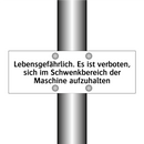 Lebensgefährlich. Es ist verboten, sich im Schwenkbereich der Maschine aufzuhalten