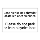 Bitte hier keine Fahrräder abstellen /.../ - Please do not park or lean bicycles /.../