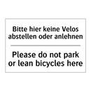 Bitte hier keine Velos abstellen /.../ - Please do not park or lean bicycles /.../