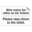 Bitte treten Sie näher an die /.../ - Please step closer to the toilet./.../