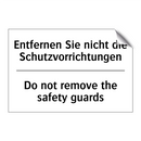 Entfernen Sie nicht die Schutzvorrichtungen/.../ - Do not remove the safety guards/.../