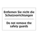 Entfernen Sie nicht die Schutzvorrichtungen/.../ - Do not remove the safety guards/.../