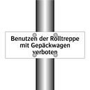 Benutzen der Rolltreppe mit Gepäckwagen verboten