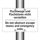 Fluchtwege und Fluchttüren nicht /.../ - Do not obstruct escape routes /.../