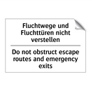 Fluchtwege und Fluchttüren nicht /.../ - Do not obstruct escape routes /.../