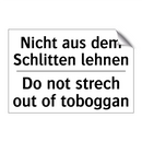 Nicht aus dem Schlitten lehnen - Do not strech out of toboggan