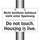 Nicht berühren Gehäuse steht unter /.../ - Do not touch. Housing is live.