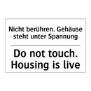 Nicht berühren. Gehäuse steht /.../ - Do not touch. Housing is live