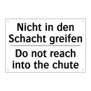 Nicht in den Schacht greifen - Do not reach into the chute