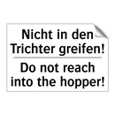 Nicht in den Trichter greifen! - Do not reach into the hopper!