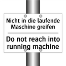 Nicht in die laufende Maschine /.../ - Do not reach into running machine/.../