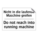 Nicht in die laufende Maschine /.../ - Do not reach into running machine/.../