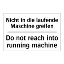 Nicht in die laufende Maschine /.../ - Do not reach into running machine/.../
