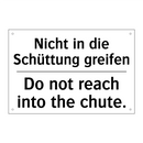 Nicht in die Schüttung greifen - Do not reach into the chute.