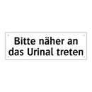 Bitte näher an das Urinal treten