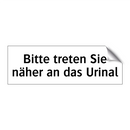 Bitte treten Sie näher an das Urinal