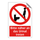 Bitte näher an das Urinal treten