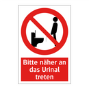 Bitte näher an das Urinal treten