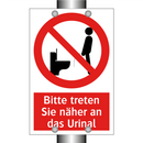 Bitte treten Sie näher an das Urinal