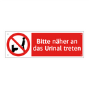 Bitte näher an das Urinal treten