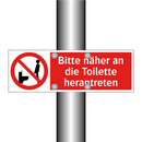 Bitte näher an die Toilette herantreten