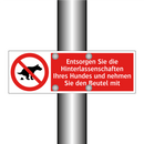 Entsorgen Sie die Hinterlassenschaften Ihres Hundes und nehmen Sie den Beutel mit