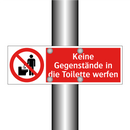 Keine Gegenstände in die Toilette werfen