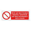 Nicht auf dem Vordach betreten. Aufenthalt auf dem Schiebedach nicht erlaubt