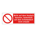 Nicht auf dem Vordach betreten. Aufenthalt auf dem Schiebedach nicht erlaubt
