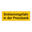 Einklemmgefahr in der Pressbank