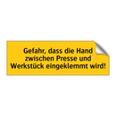 Gefahr, dass die Hand zwischen Presse und Werkstück eingeklemmt wird!