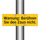 Warnung: Berühren Sie den Zaun nicht.