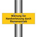 Warnung vor Handverletzung durch Riemenantrieb