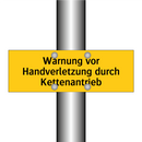 Warnung vor Handverletzung durch Kettenantrieb